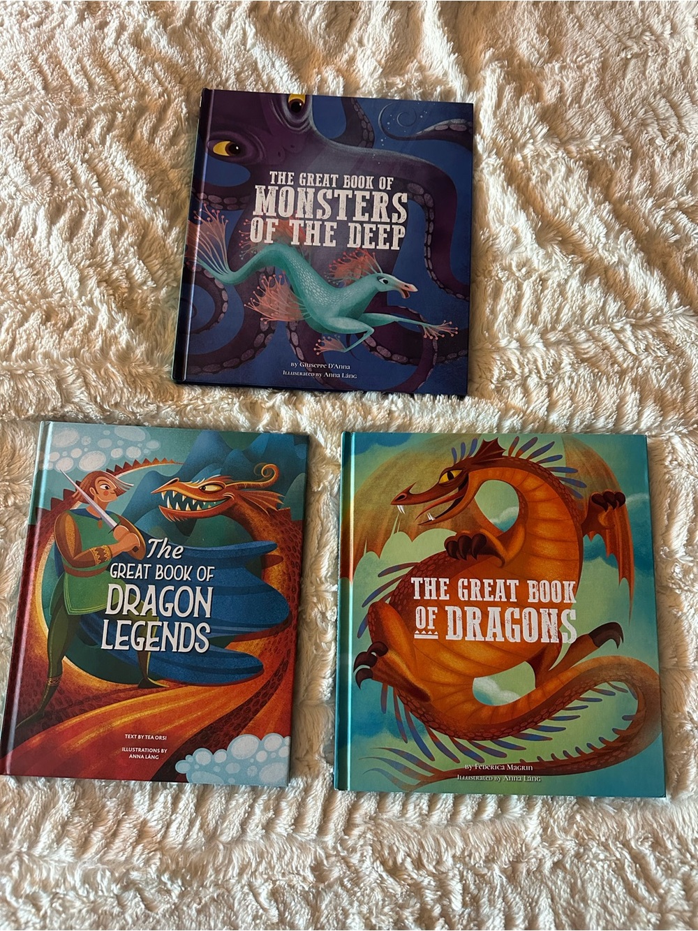 Set of 3 hardcover kids books- great book of dragons, dragon legends & monsters